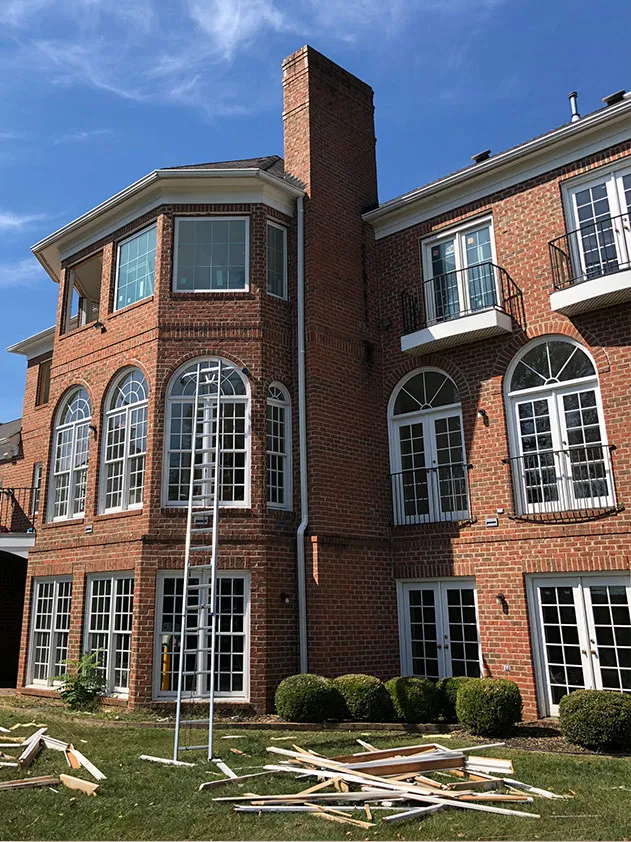 The Renewal by Andersen crew installing our new black windows