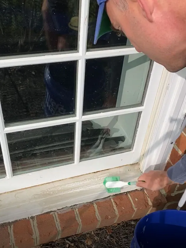 A dish scrubber makes a great tool to remove the dirt and grime from window sills.