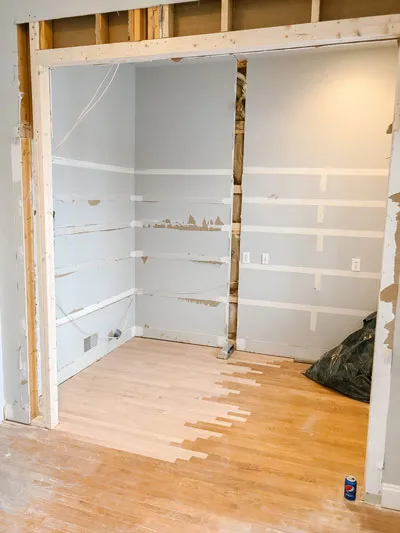 We removed the walls in the space and feathered in new red oak.