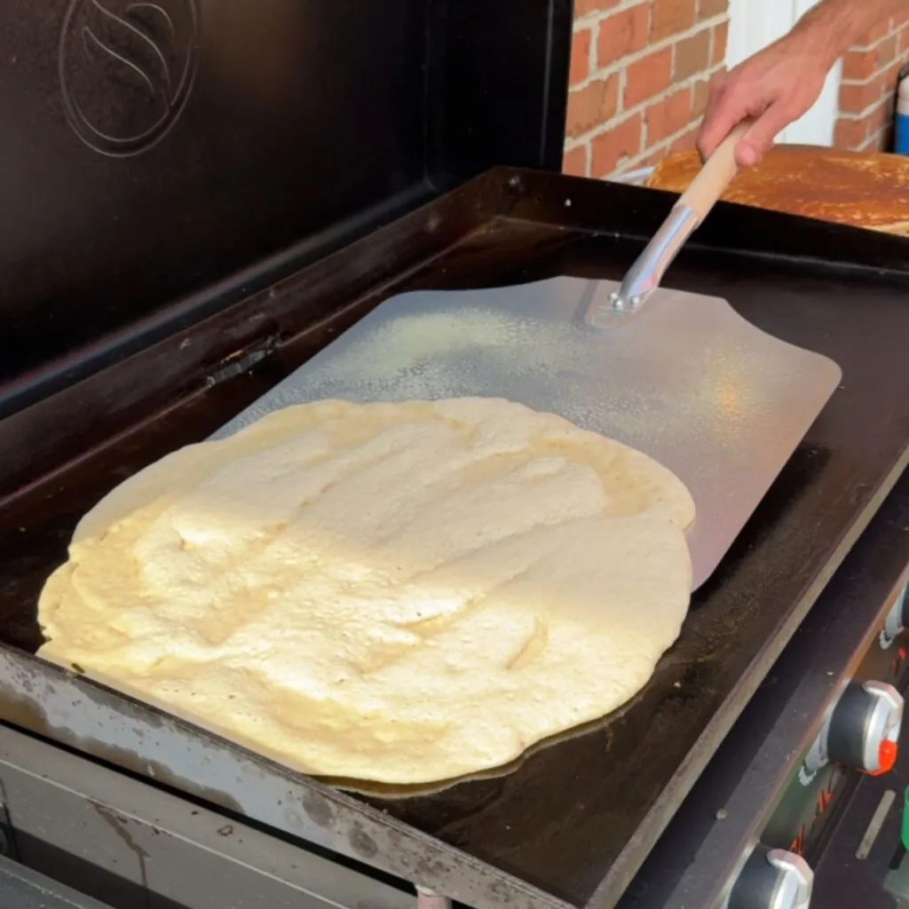 A greased pizza peel is the perfect flipper for Uncle Buck Pancakes