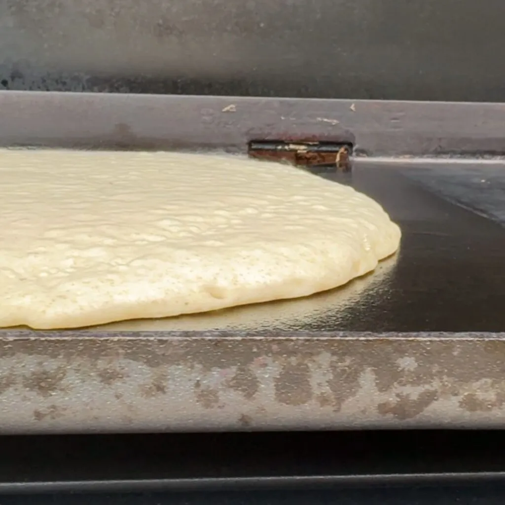 Pour the batter to form a pancake that is 16-18 inches in diameter