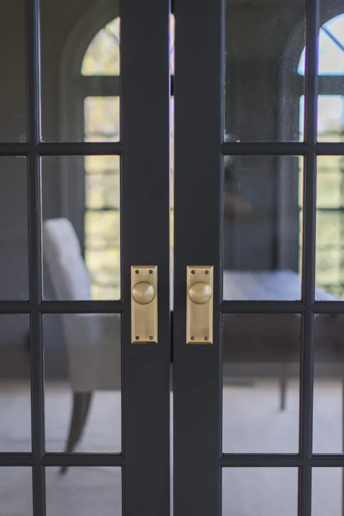 Brass door knob hardware with backplate