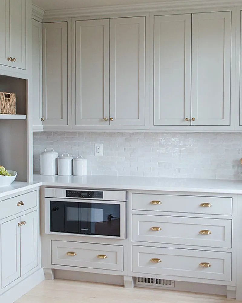This custom pantry went from a dark, two pantry design to an open, light and bright custom walk in pantry!